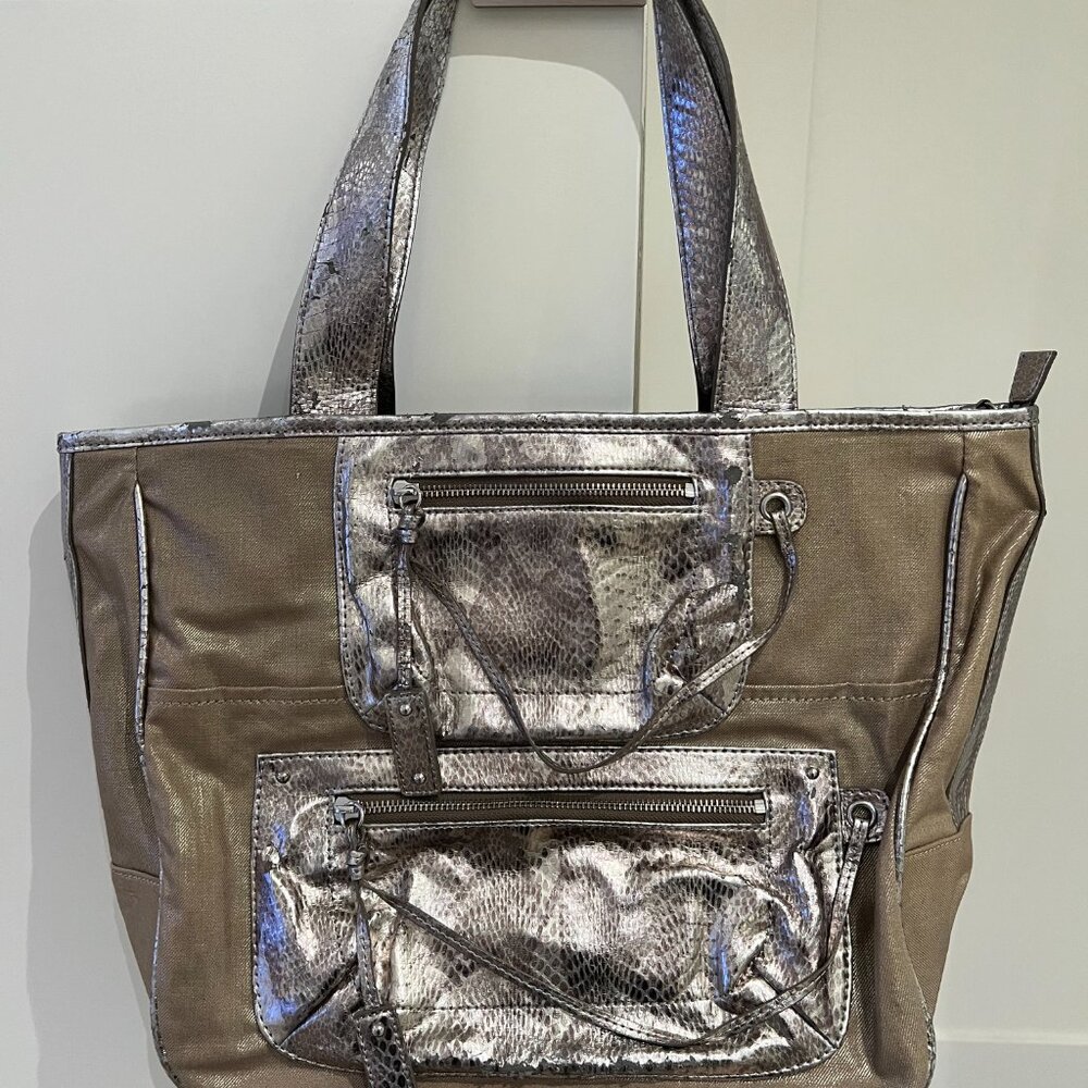 Note some of the silver design is peeling.